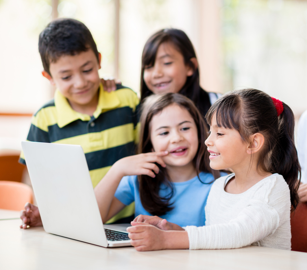 Group of kids using a computer